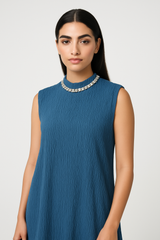 طقم مكون من قطعتين بتصميم مكسّر (فستان بلا أكمام + كارديغان)