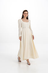Elegant Long-Sleeve Maxi Dress with Embellished Pleats