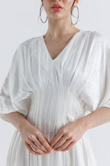 فستان ساتان مطوي بحافة غير متساوية