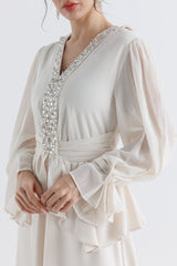 Crystal-Embellished Peplum Gown with Draped Sleeves